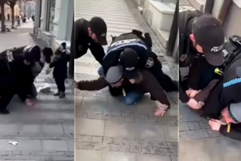 Bărbat imobilizat şi pus la pământ de doi poliţişti, în fața copilului de trei ani, pentru că nu purta mască